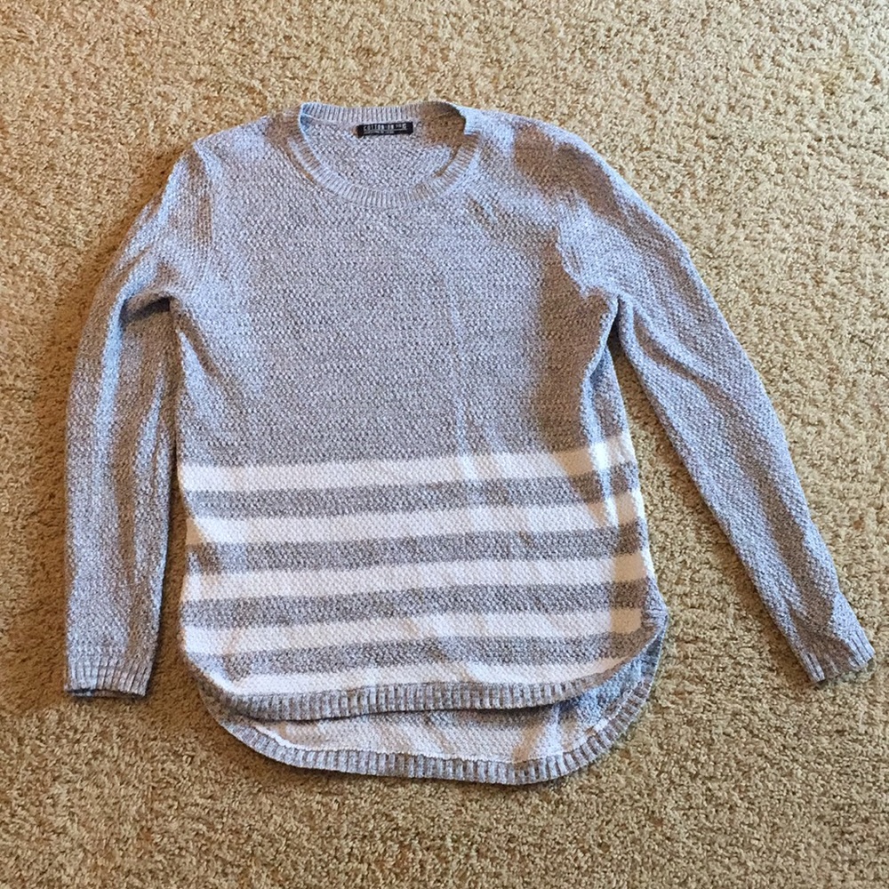Grey sweater with white stripes